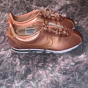 Rose gold Nike Cortez